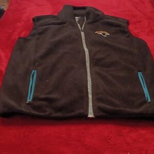 NFL, Black sleeveless, fleece jaguar sweater,  zip front and pockets.